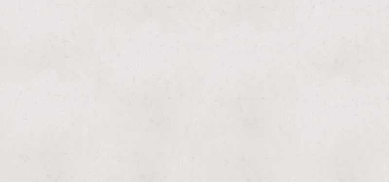 Wilsonart Carrara Codena quartz swatch: white marble-look surface with subtle veining