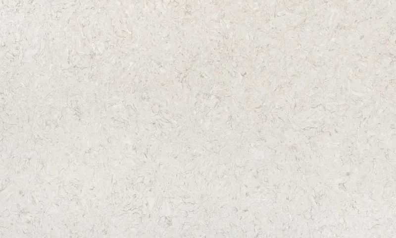 Wilsonart Desert Wind quartz swatch: beige marble-look surface with subtle veining