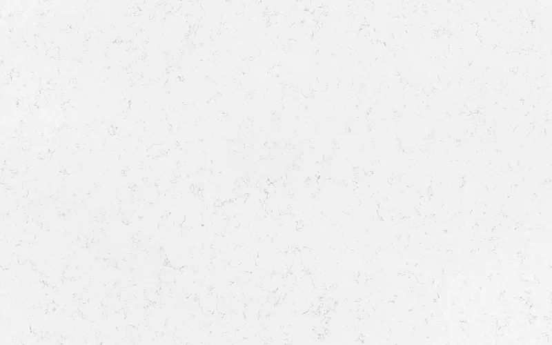 Wilsonart Haida quartz swatch: white marble-look surface with subtle veining