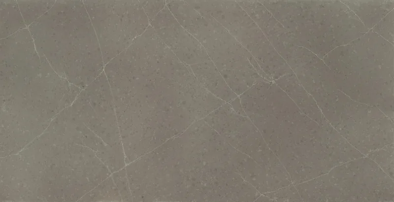 Wilsonart Logan Pass quartz swatch: gray marble-look surface with moderate veining