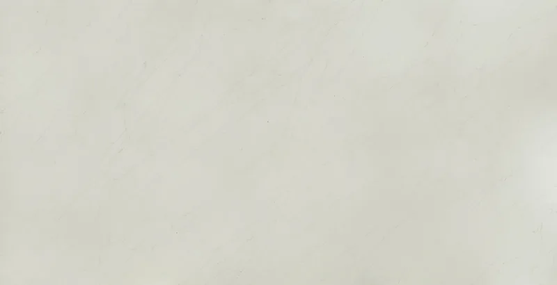 Wilsonart Madeira Beach quartz swatch: white marble-look surface with subtle veining