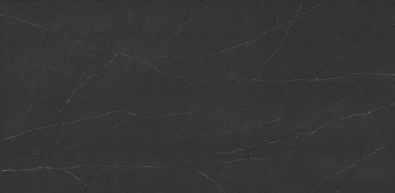 Wilsonart Nova Serrana quartz swatch: black stone-look surface with moderate veining