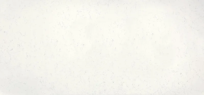 Wilsonart Svalbard quartz swatch: white marble-look surface with moderate veining