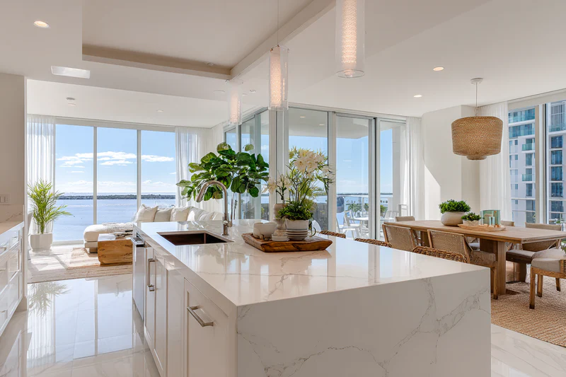 Modern condo kitchen renovation with quartz countertops overlooking Fort Lauderdale Intracoastal